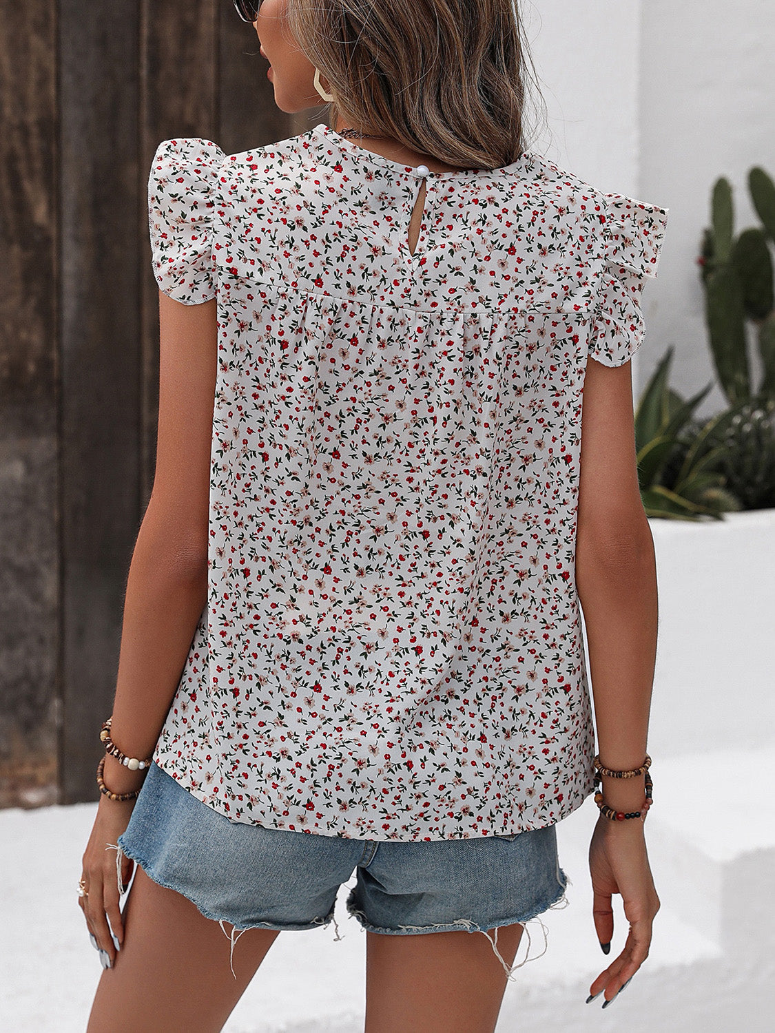 Ruffled Printed Round Neck Cap Sleeve Blouse